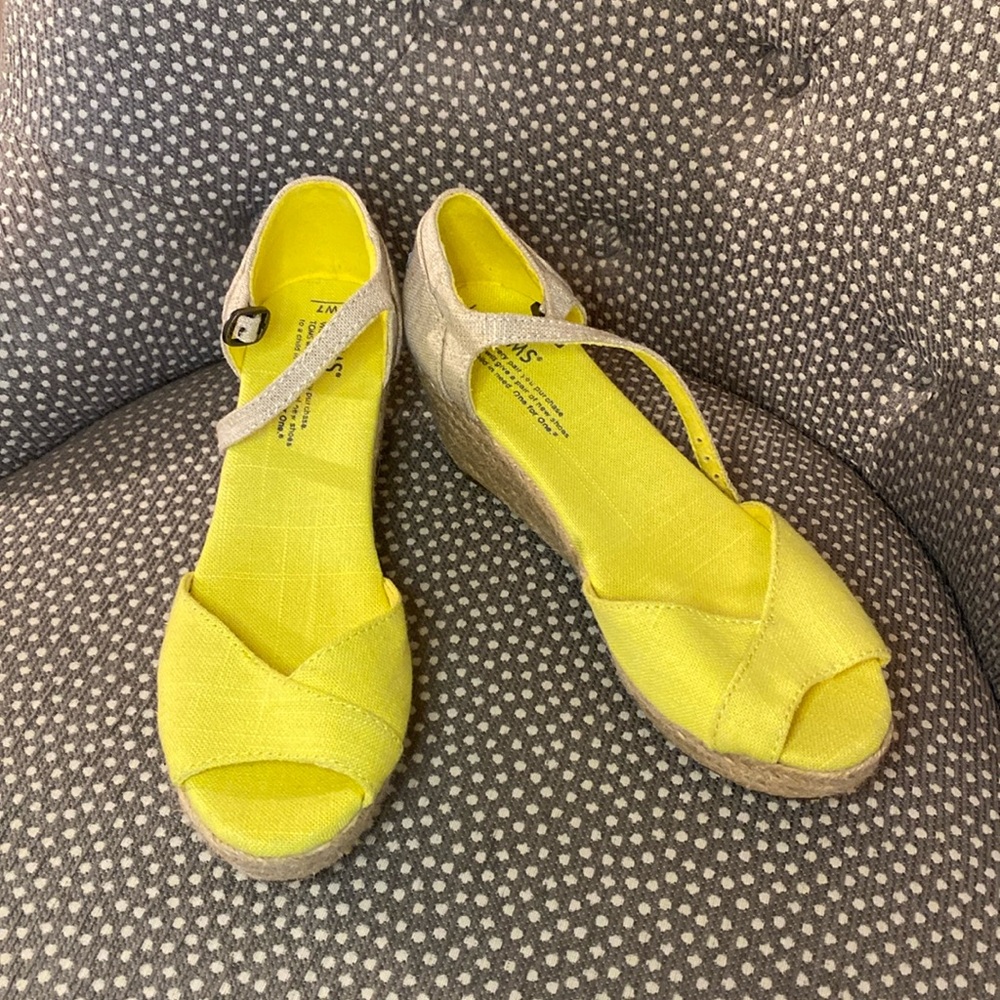 Yellow TOM’s wedge sandals. Size 7 Never worn